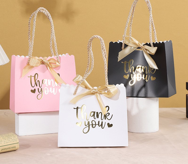 Bow-Decorated Paper Gift Bag for Favors and Candy detail image 3