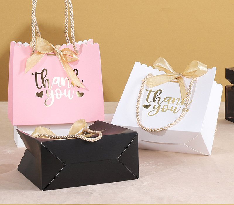 Bow-Decorated Paper Gift Bag for Favors and Candy detail image 6