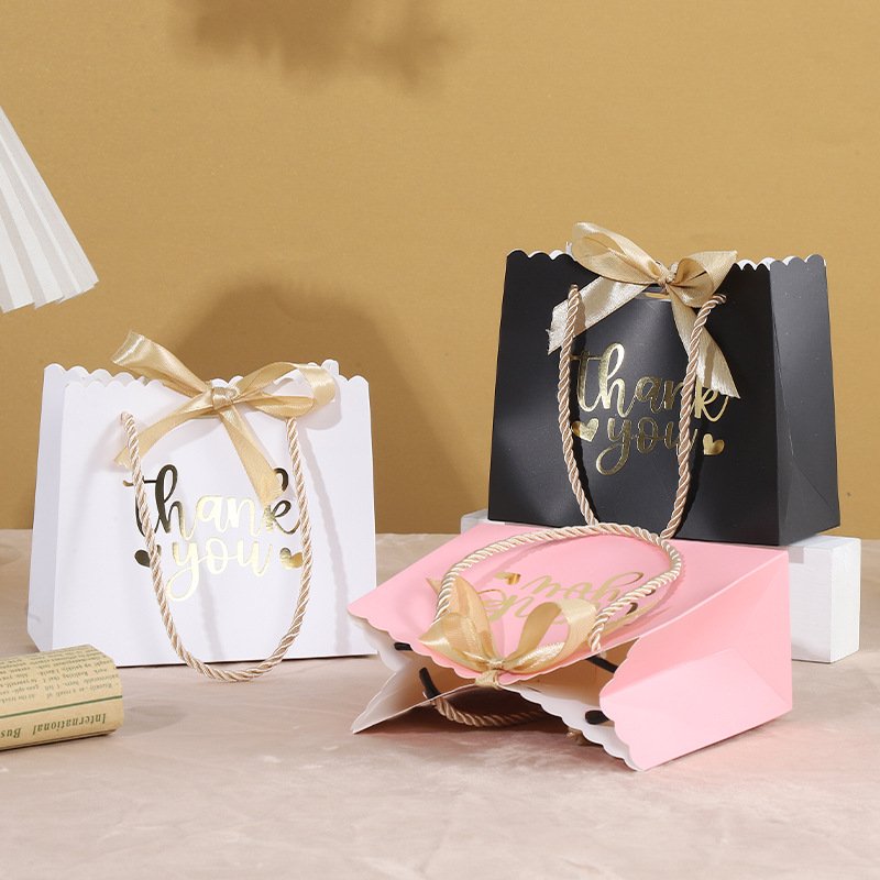 Bow-Decorated Paper Gift Bag for Favors and Candy main image 1